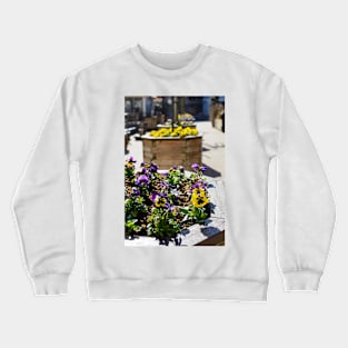 Flower bed with yellow and violet pansies Crewneck Sweatshirt